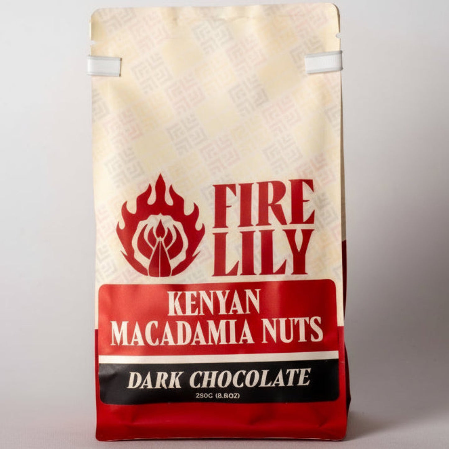 Fire Lily Kenyan Macadamia Nuts Dark Chocolate packaging on a white background